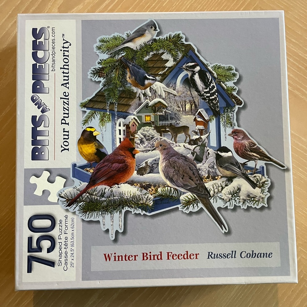 750 piece Winter Bird Feeder shaped jigsaw puzzle by Bits and Pieces.